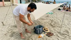 Sombra grande sin cargar carpa: el toldo en vela y el detalle que lo deja firme incluso con brisa